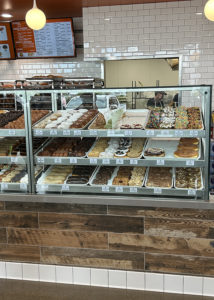 Display of fresh donuts at Randy's Donuts in San Diego