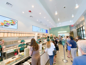 Long lines for fresh and healthy salads at the grand opening of Sweetgreen Del Mar. 